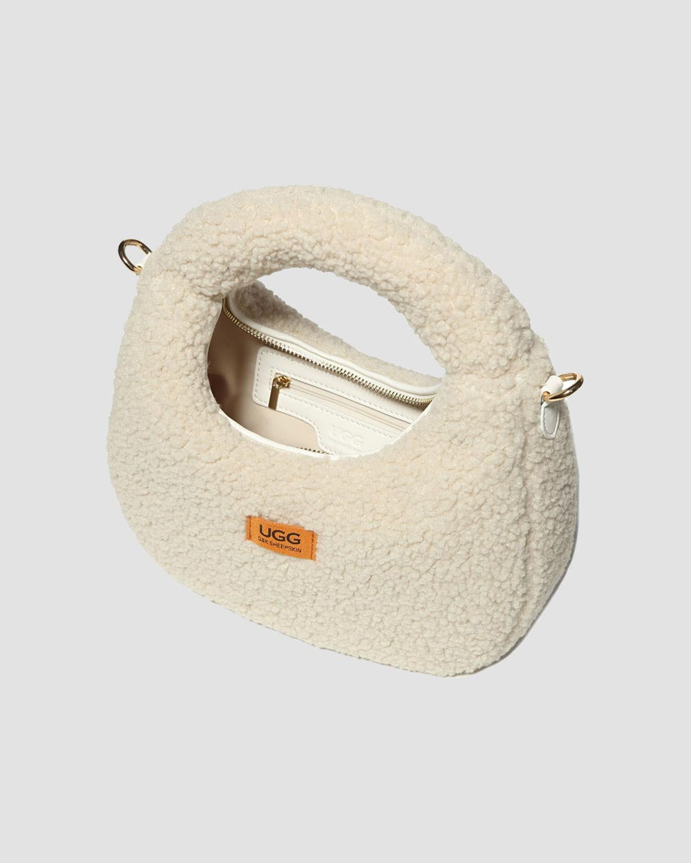 luxe cloud crescent ugg bag angle